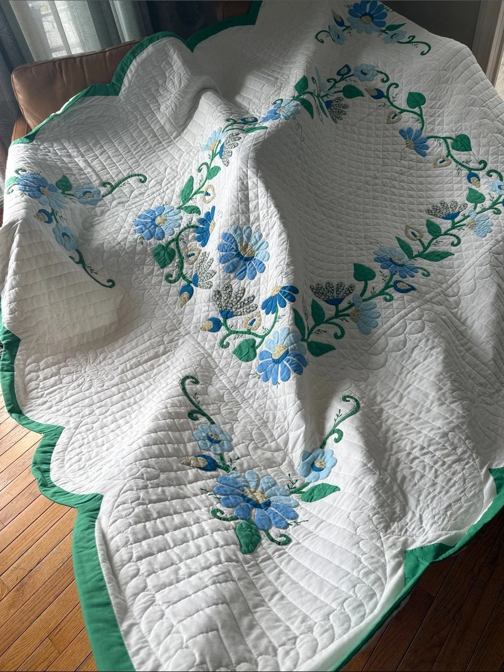 White Quilted Floral Bedspread with Blue and Green Accents